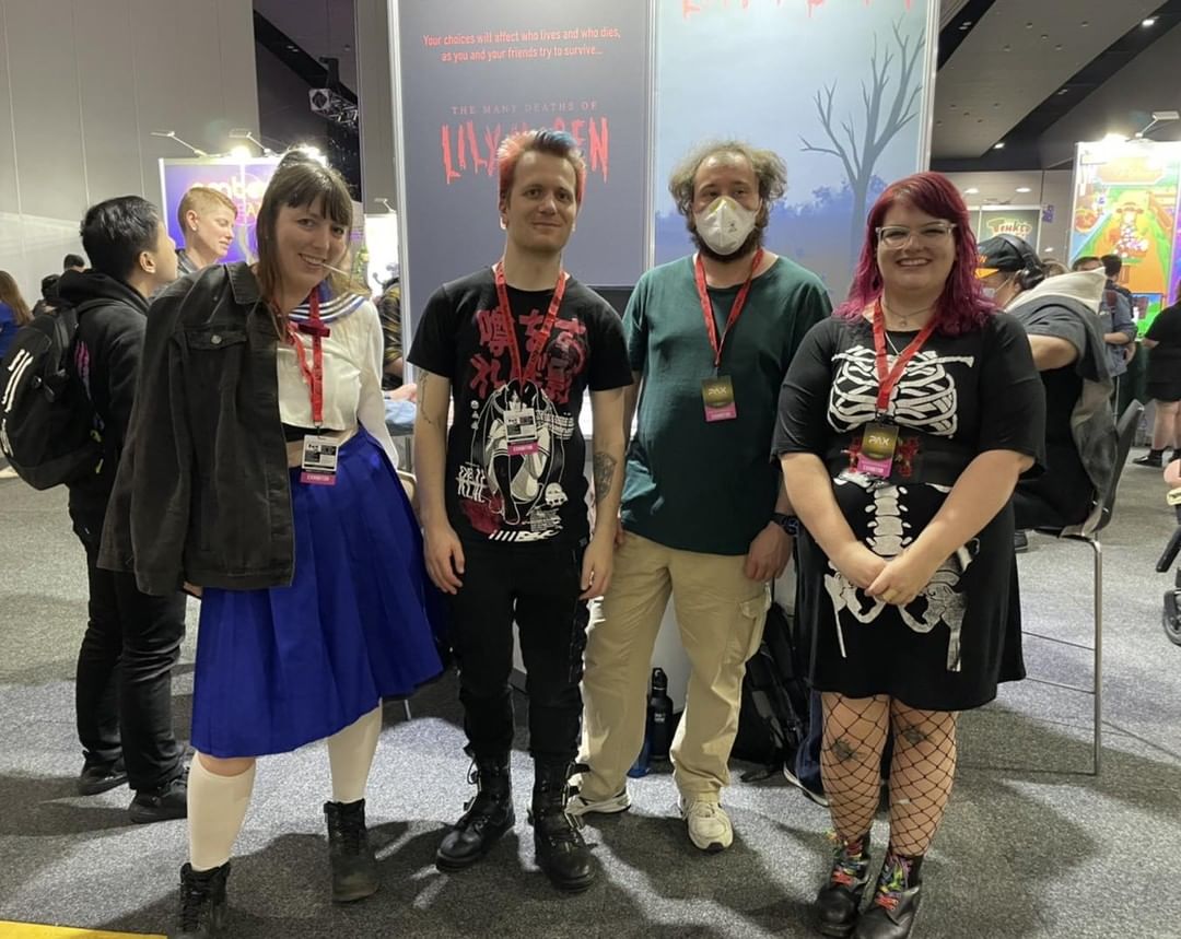 Volunteers for the Too Many Teeth booth at PAX 2022